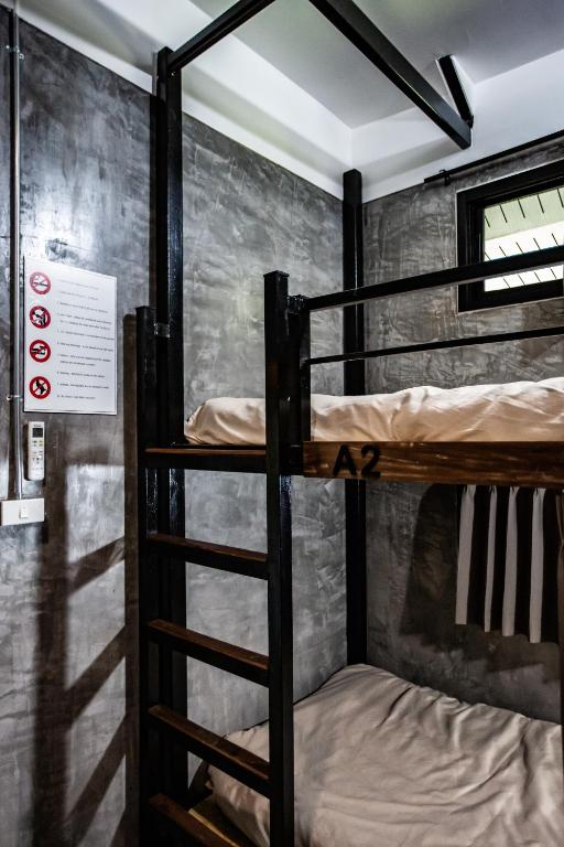 Postel nebo postele na pokoji v ubytování Pai My Way Hostel
