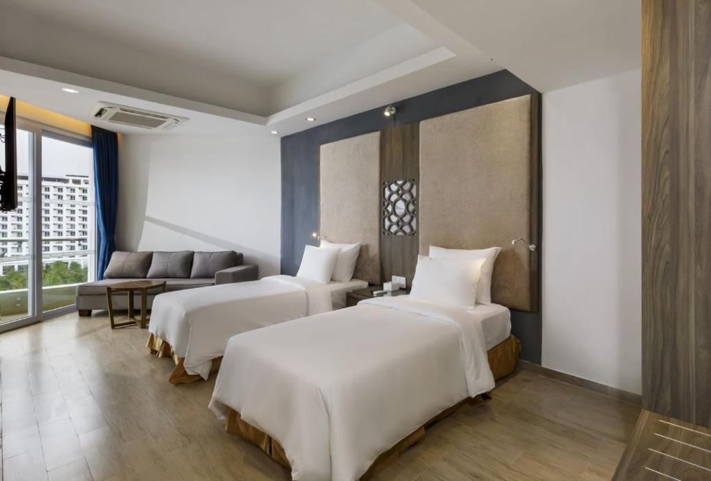 Кровать или кровати в номере Swandor Cam Ranh Resort-Ultra All Inclusive