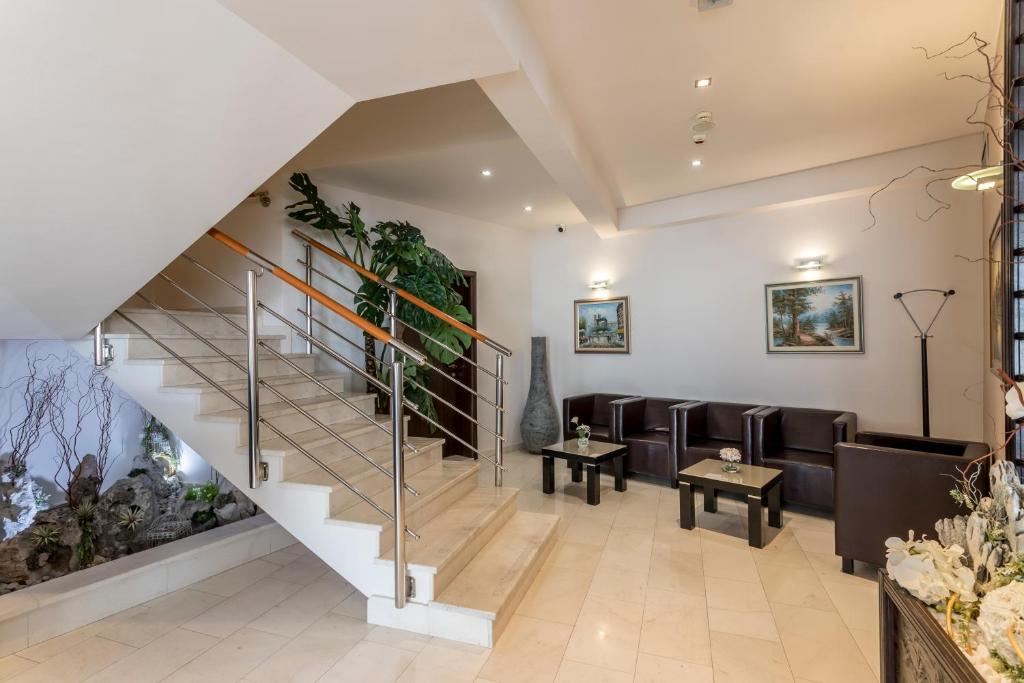 Posedenie v ubytovaní Hotel As