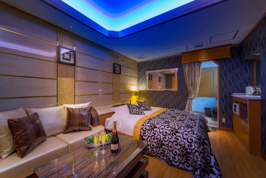 Postel nebo postele na pokoji v ubytování HOTEL W-AVANZA-W GROUP HOTELS and RESORTS-
