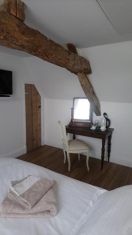 Postel nebo postele na pokoji v ubytování Frenes B&B