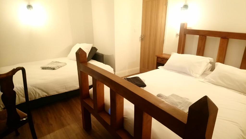 Postel nebo postele na pokoji v ubytování Frenes B&B