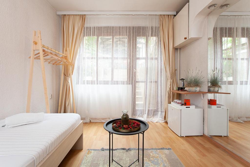 Postel nebo postele na pokoji v ubytování Urban Hostel & Apartments