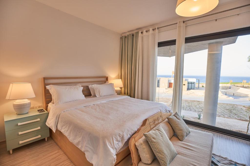Postel nebo postele na pokoji v ubytování VESTA - Soma Bay Residence