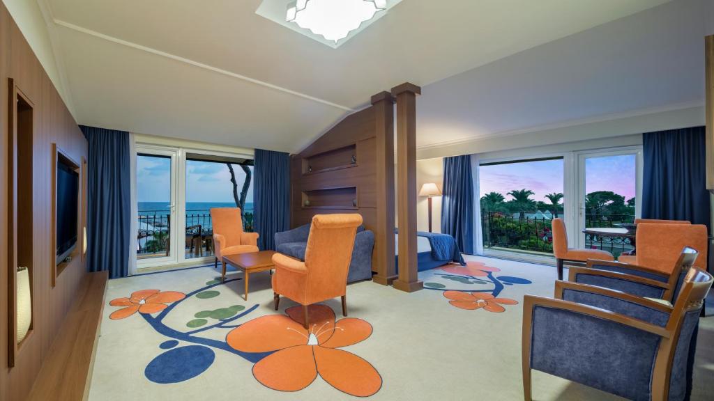 a rendering of a living room with a suite at Pine Beach Belek in Belek