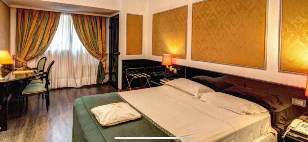 Postel nebo postele na pokoji v ubytování Hotel Motel Regal