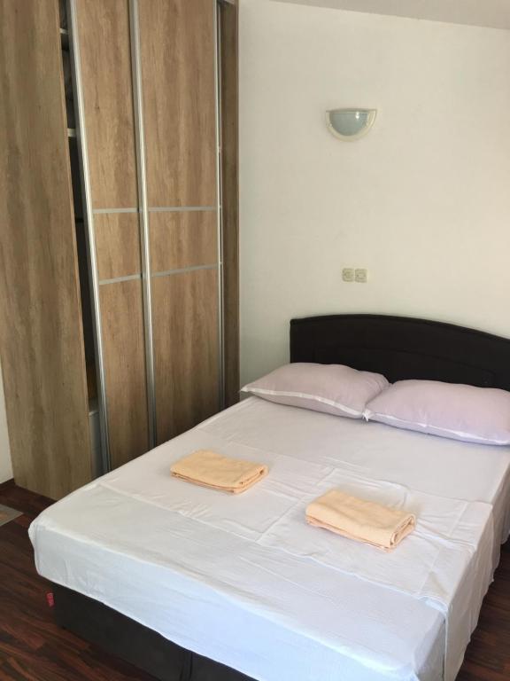 Posteľ alebo postele v izbe v ubytovaní Apartmani Glavina