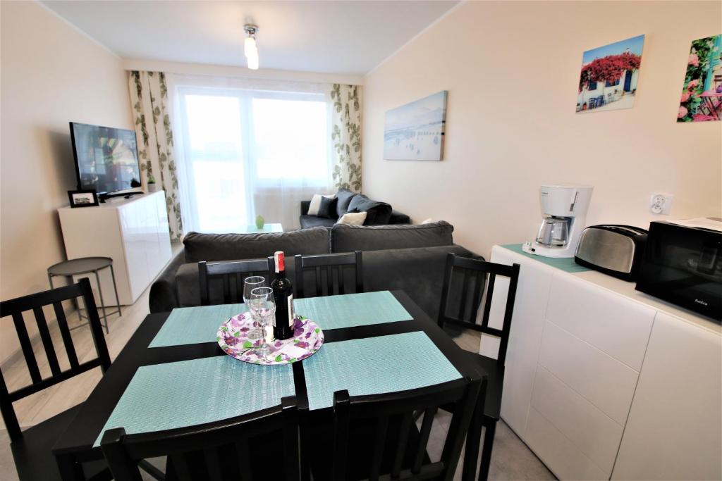 Kuchyňa alebo kuchynka v ubytovaní Apartament Superior Pastelowy Przy Plaży
