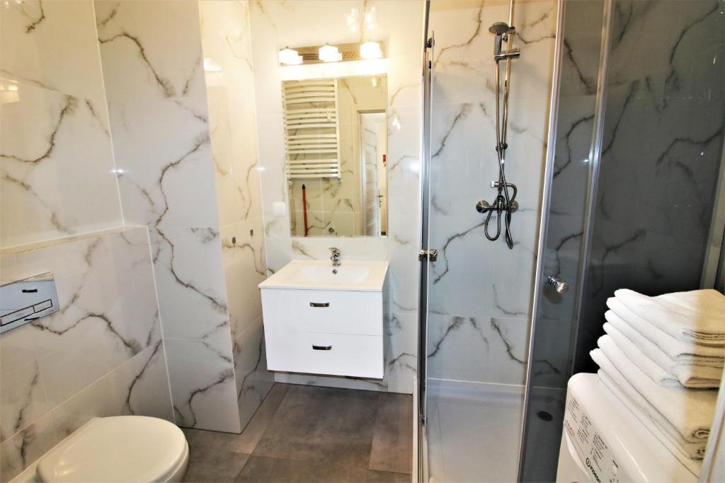 Kúpeľňa v ubytovaní Apartament Superior Pastelowy Przy Plaży