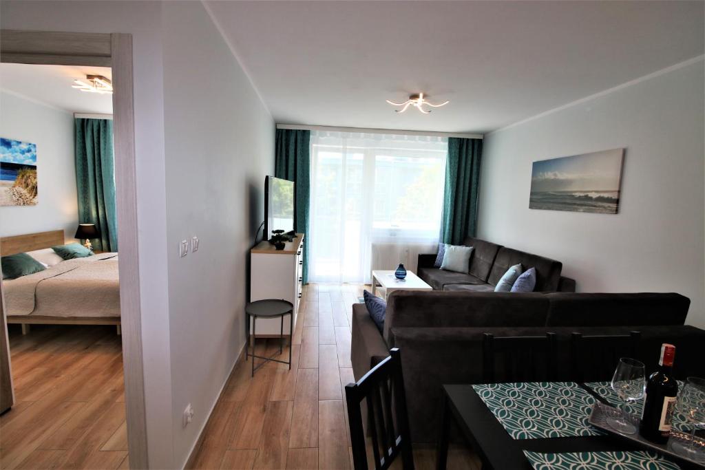 Posteľ alebo postele v izbe v ubytovaní Bliżej Morza Luxury Apartments