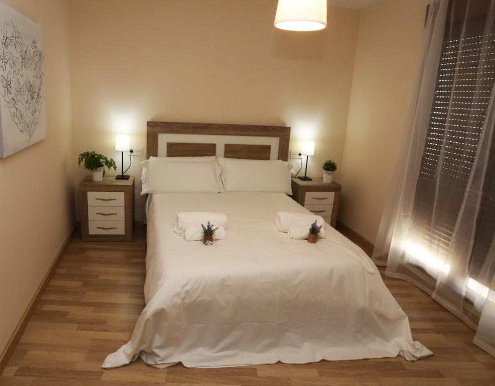 Postel nebo postele na pokoji v ubytování Apartamento turisticos Puente Romano P3 1-B