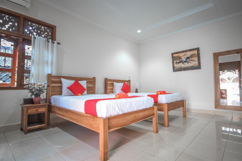 Postel nebo postele na pokoji v ubytování Satya House Ubud