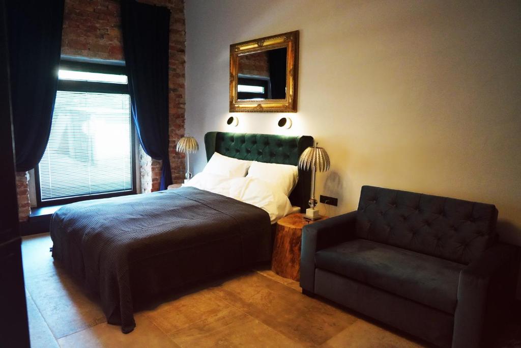 Posteľ alebo postele v izbe v ubytovaní Apartamenty Centrum RS SUITES Kowalska 12