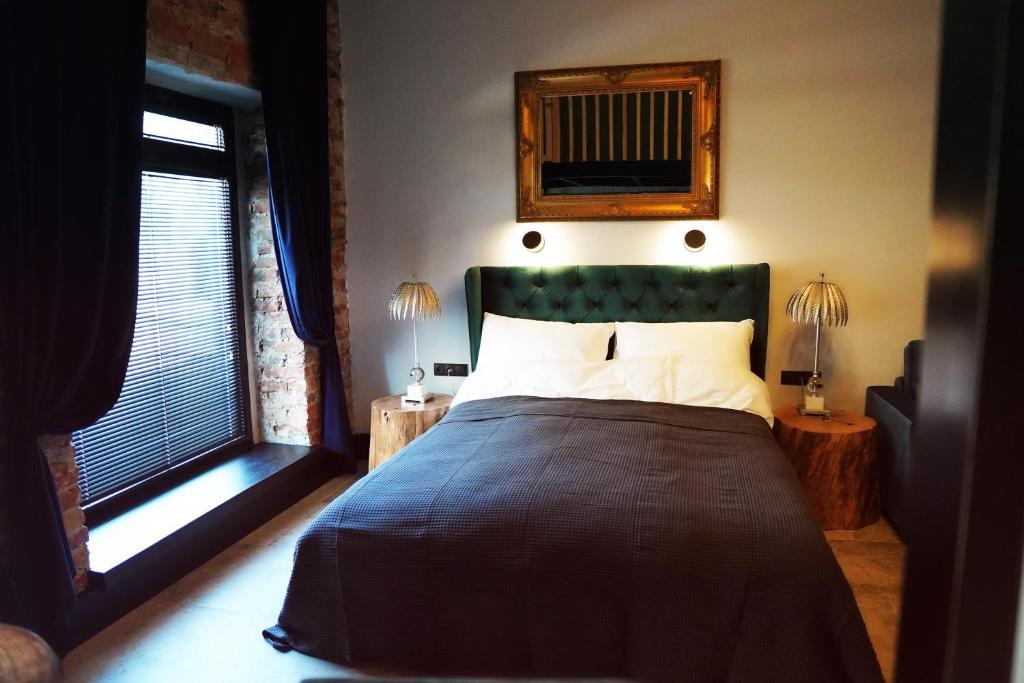 Posteľ alebo postele v izbe v ubytovaní Apartamenty Centrum RS SUITES Kowalska 12