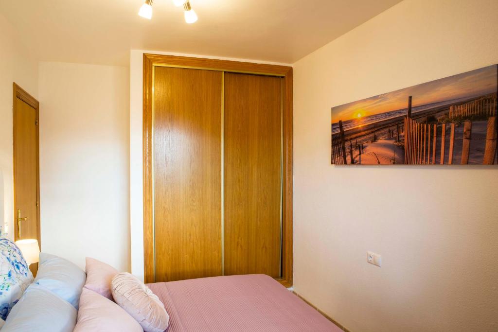 Posteľ alebo postele v izbe v ubytovaní Apartment las sirenas -WiFi 100 Mb-, Sea view