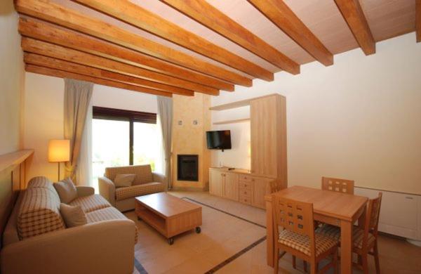 Televízia a/alebo spoločenská miestnosť v ubytovaní Tassido Coda Resort