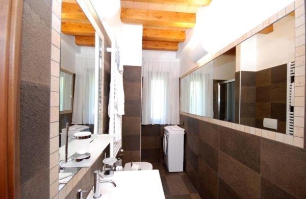 Kúpeľňa v ubytovaní Tassido Coda Resort
