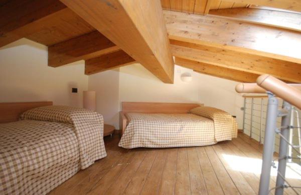 Posteľ alebo postele v izbe v ubytovaní Tassido Coda Resort