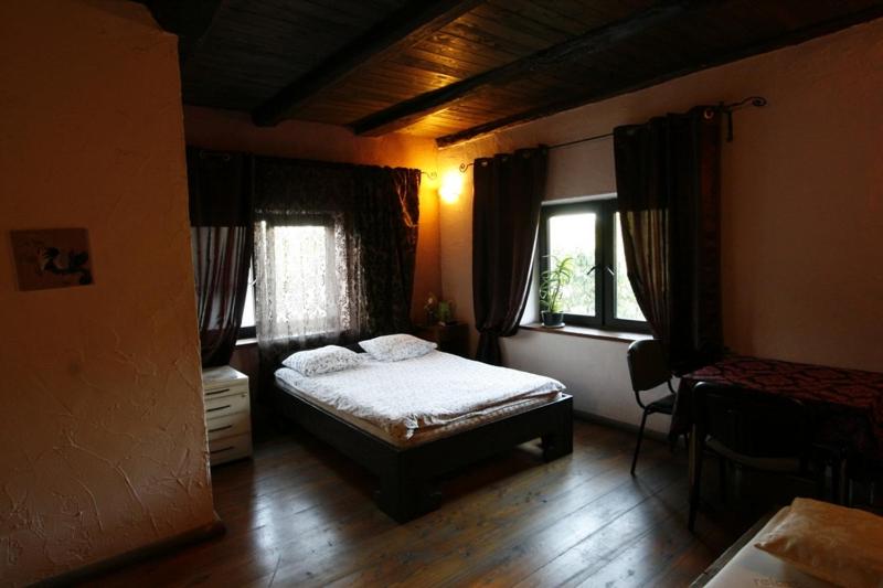 Postel nebo postele na pokoji v ubytování Dom nad Srebrną Rzeką