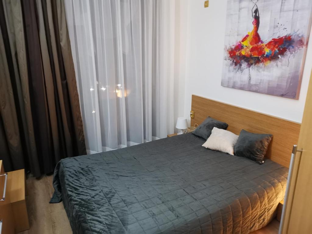 Postel nebo postele na pokoji v ubytování Paradise Bay D8 Apartment