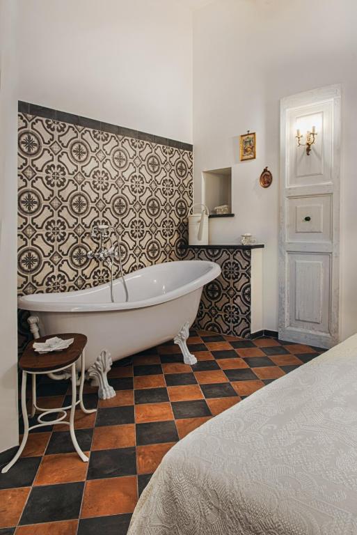 Postel nebo postele na pokoji v ubytování Sacratum B&B Suite Spa