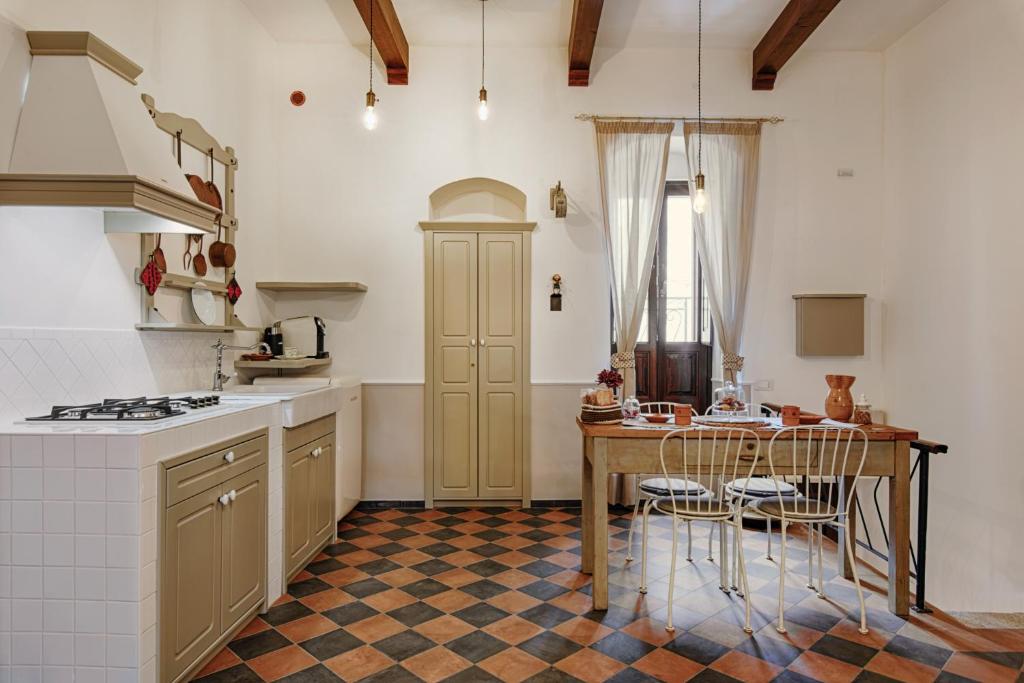Kuchyň nebo kuchyňský kout v ubytování Sacratum B&B Suite Spa