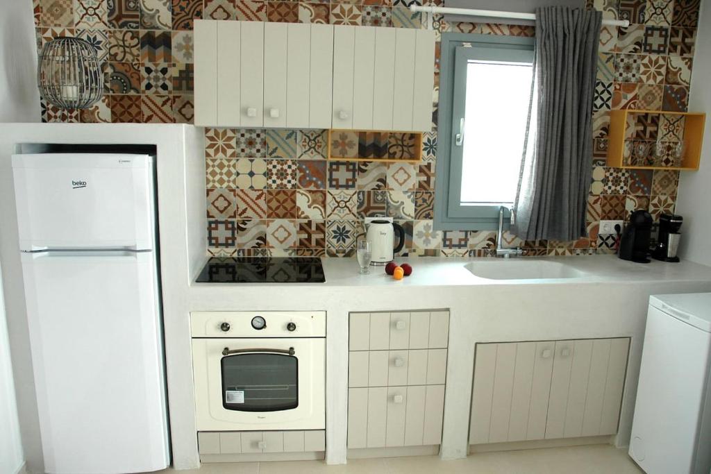 Kuchyň nebo kuchyňský kout v ubytování Kalypso House