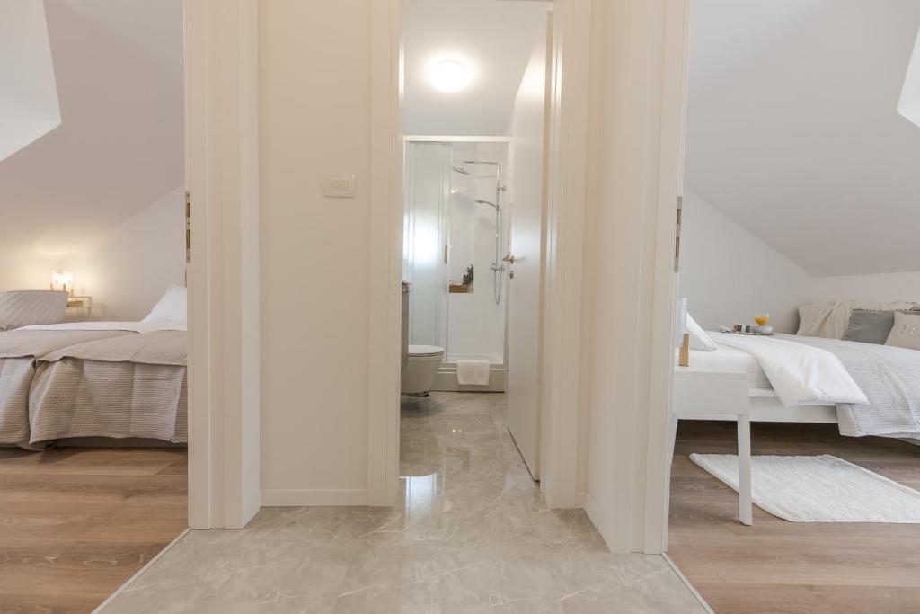 Postel nebo postele na pokoji v ubytování Enjoy Split, new apartment in the center with a private garden