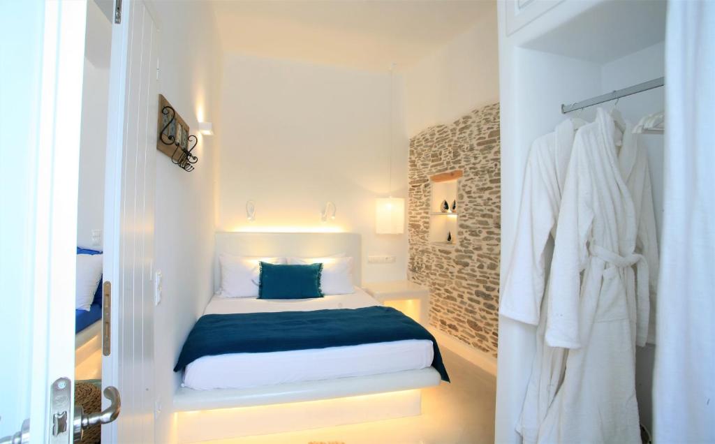A bed or beds in a room at Lasia Boutique Apartment