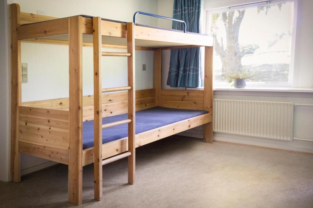 Postel nebo postele na pokoji v ubytování Djurs-BnB - Rimsøhuset