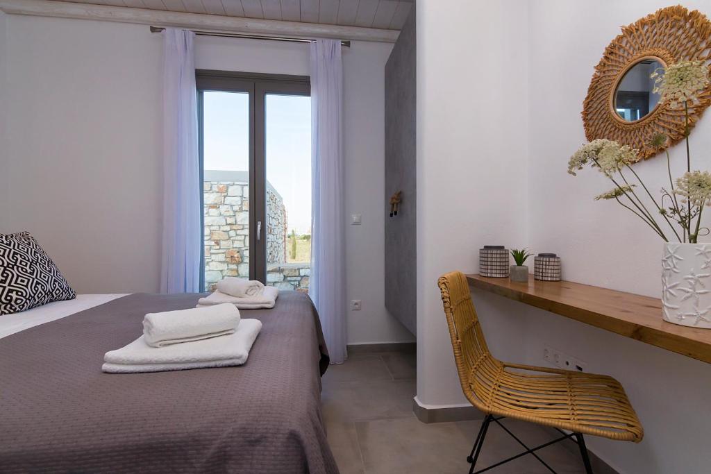 Postel nebo postele na pokoji v ubytování IL SOGNO VILLAS Paros