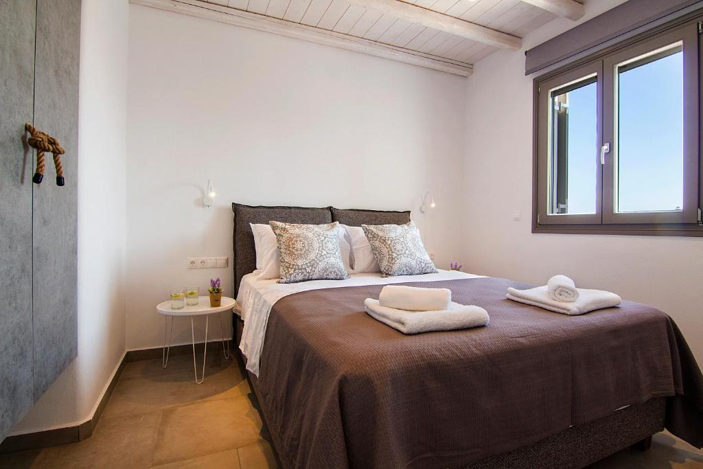 Postel nebo postele na pokoji v ubytování IL SOGNO VILLAS Paros