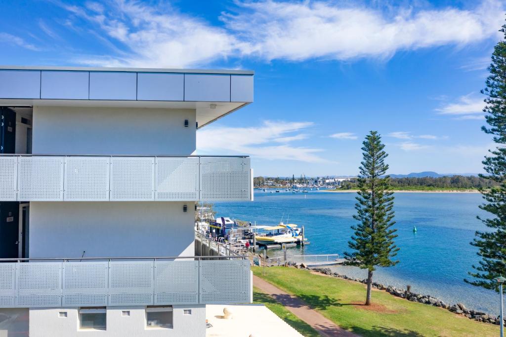 a building with a view of a body of water at The Mid Pacific in Port Macquarie