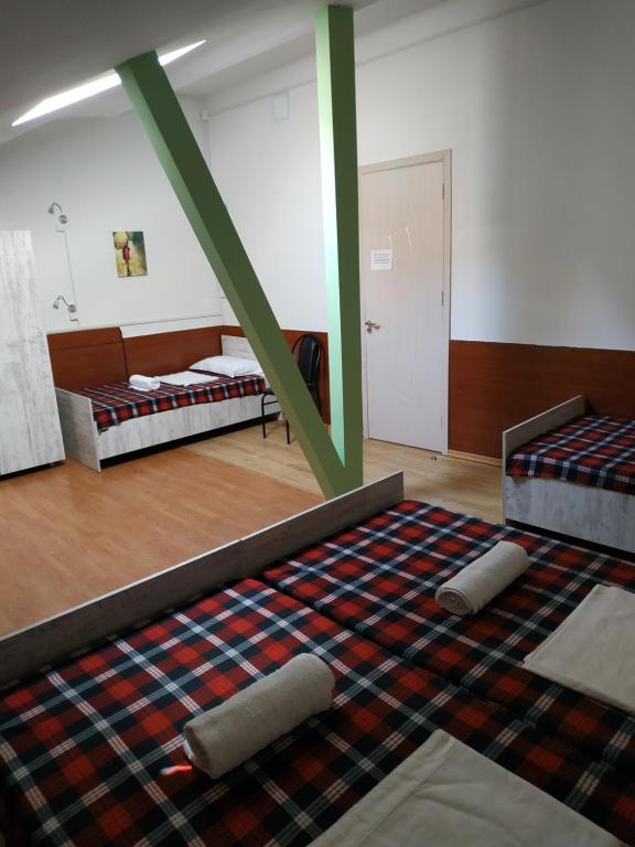 Postel nebo postele na pokoji v ubytování Hostel Portal