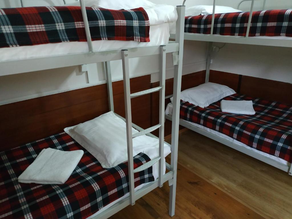 Palanda nebo palandy na pokoji v ubytování Hostel Portal