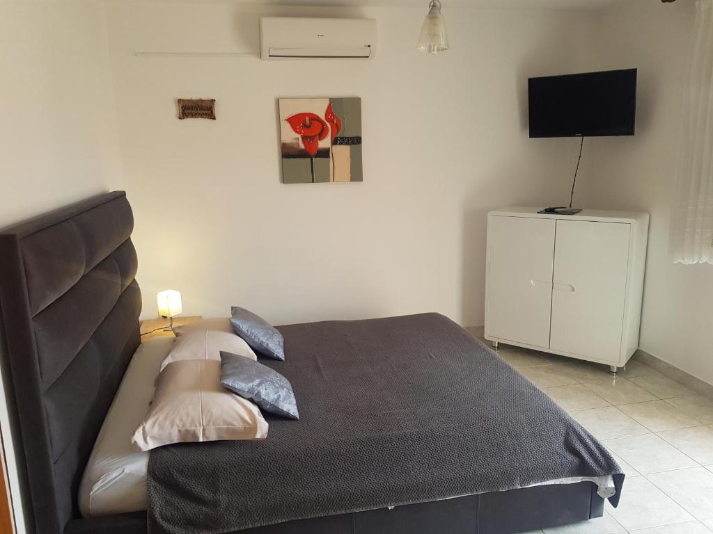 TV a/nebo společenská místnost v ubytování Apartments Iva