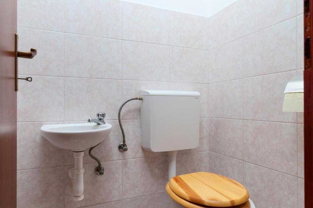 Koupelna v ubytování Yole apartman