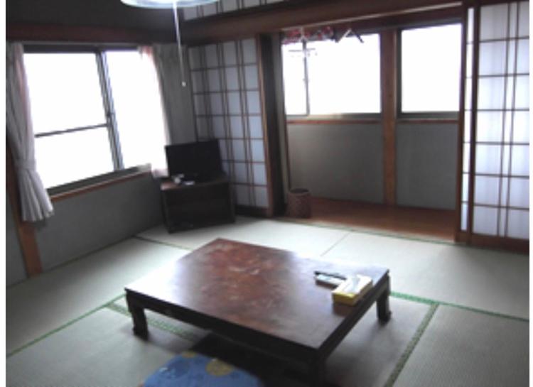TV a/nebo společenská místnost v ubytování Yakushima Park Guesthouse