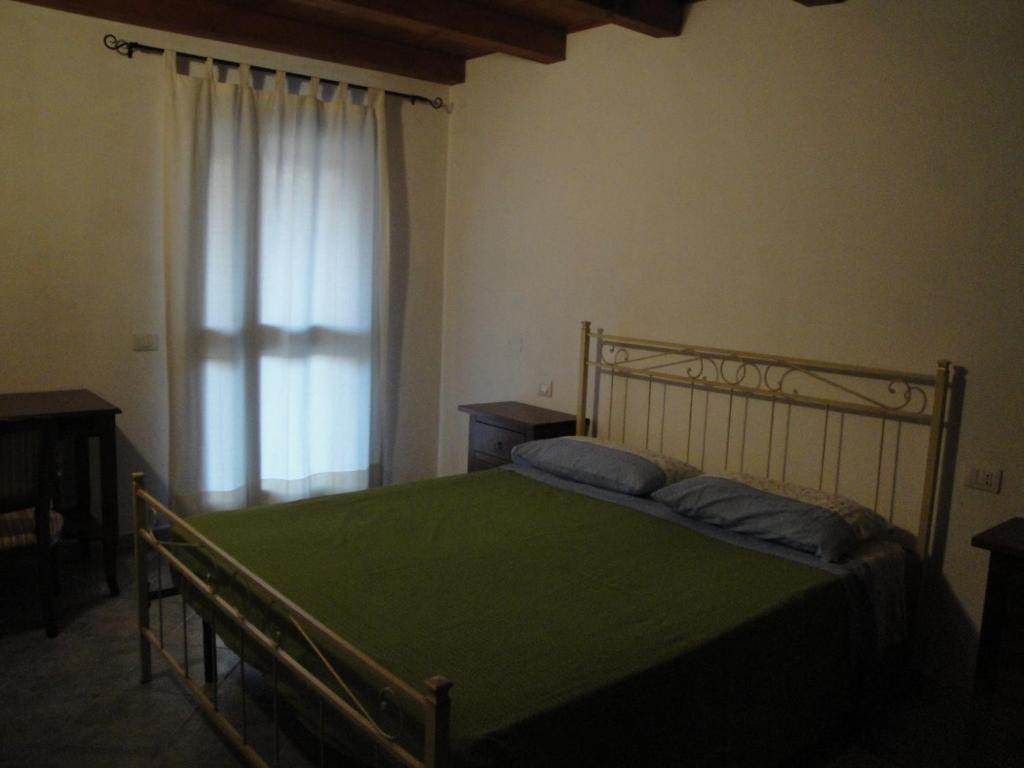 Postel nebo postele na pokoji v ubytování La Jatta