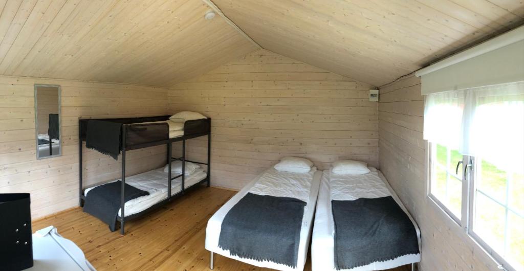 Двухъярусная кровать или двухъярусные кровати в номере Kesäaitat