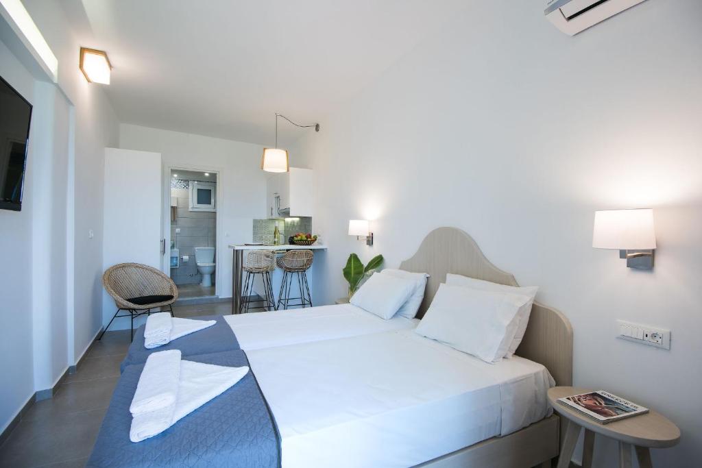 Letto o letti in una camera di Mirabella Apartments