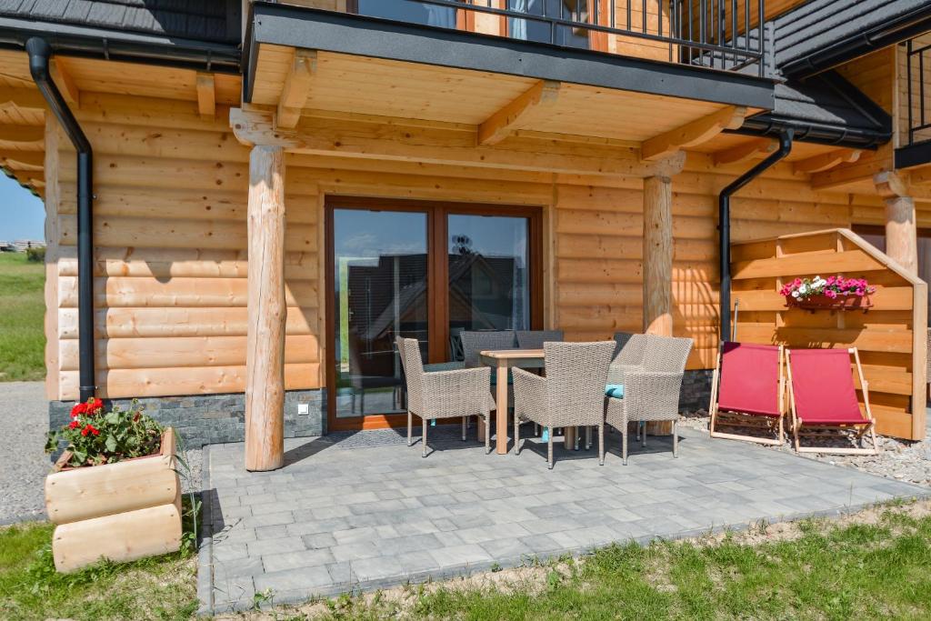 Balkón alebo terasa v ubytovaní Domki CHRYCA