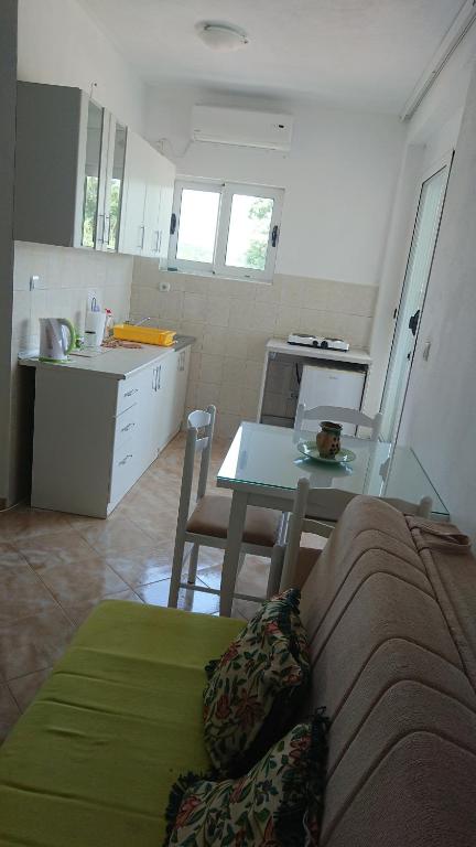 Kuchyň nebo kuchyňský kout v ubytování Luce di Sole Apartment