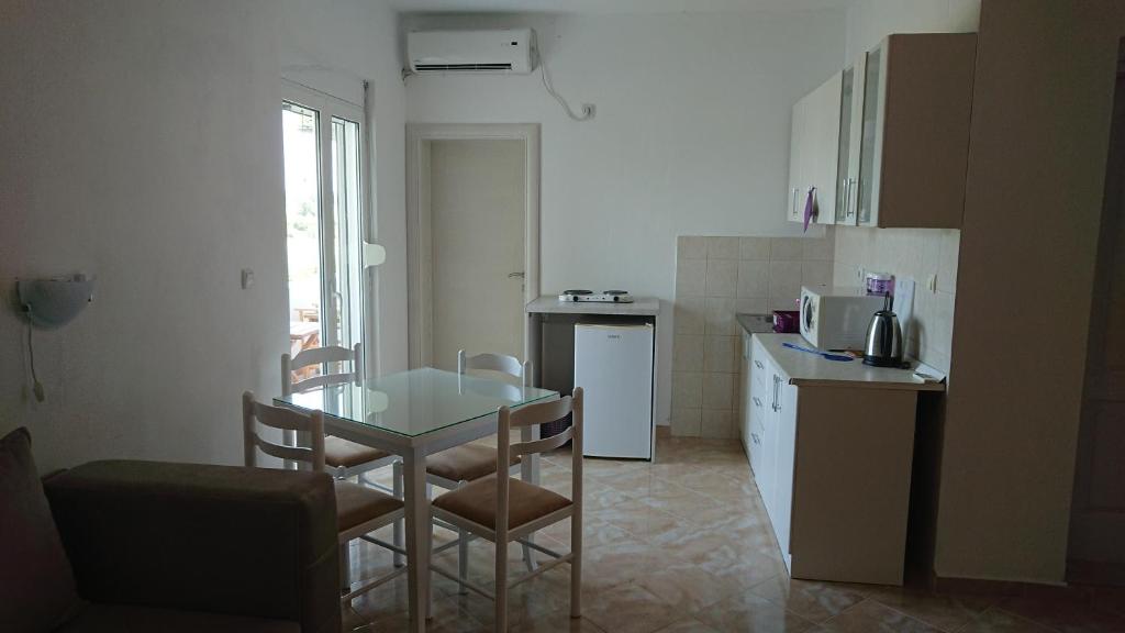 Kuchyň nebo kuchyňský kout v ubytování Luce di Sole Apartment