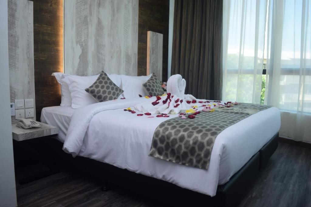 Кровать или кровати в номере Rest And Comfort Boutique Hotel