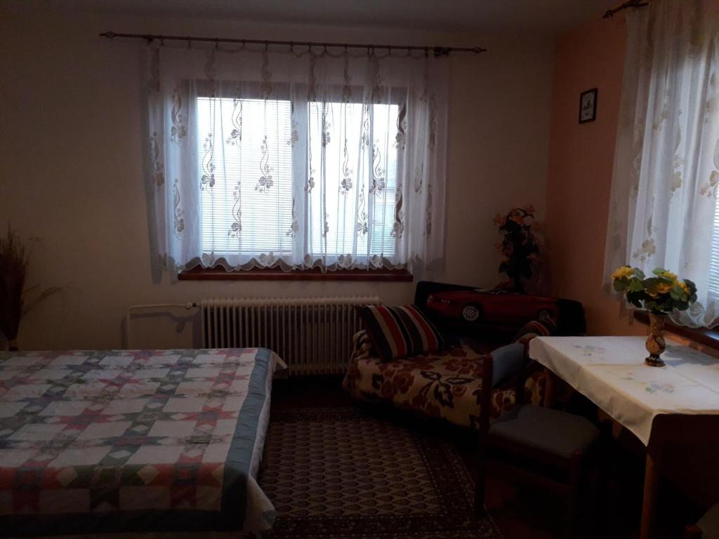 Posteľ alebo postele v izbe v ubytovaní Ladislav
