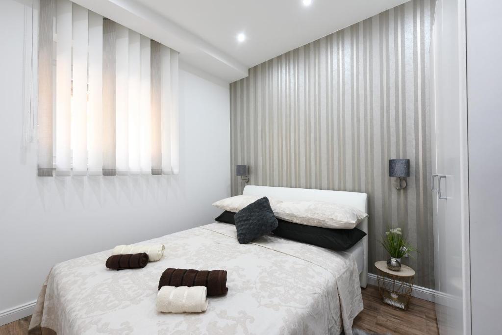 Posteľ alebo postele v izbe v ubytovaní Shine apartment Zadar