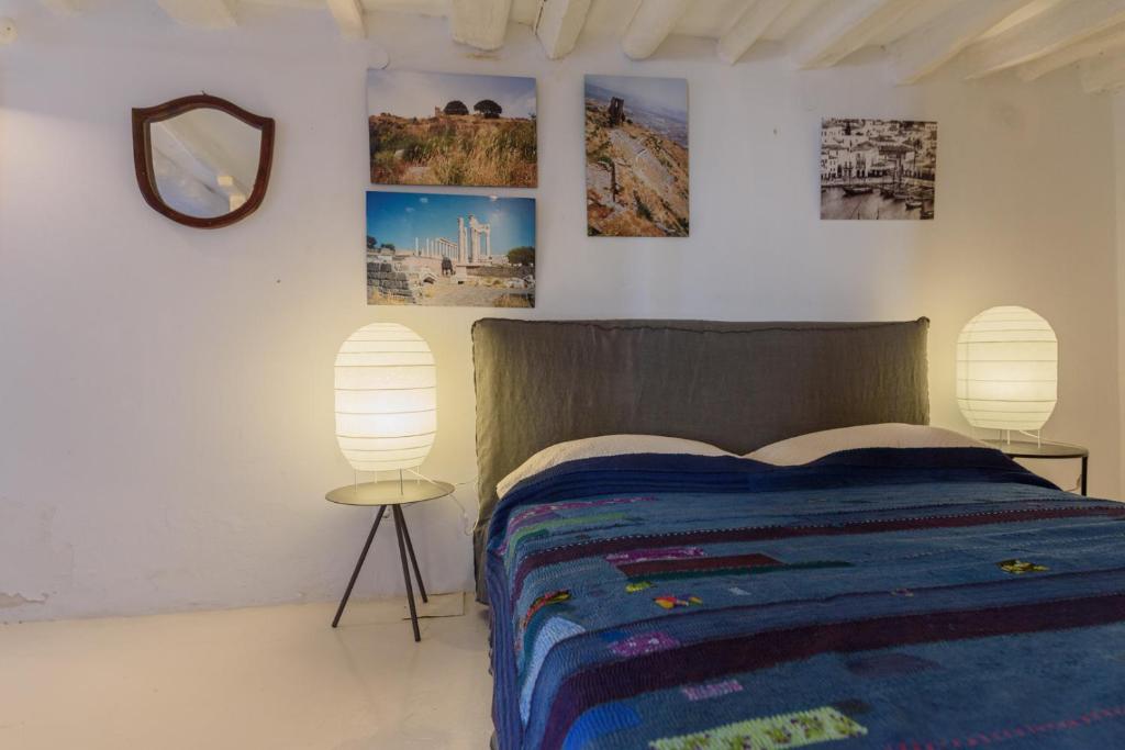 Ένα ή περισσότερα κρεβάτια σε δωμάτιο στο VITA REAL ESTATE