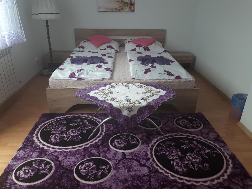 Postel nebo postele na pokoji v ubytování Homestay Renata