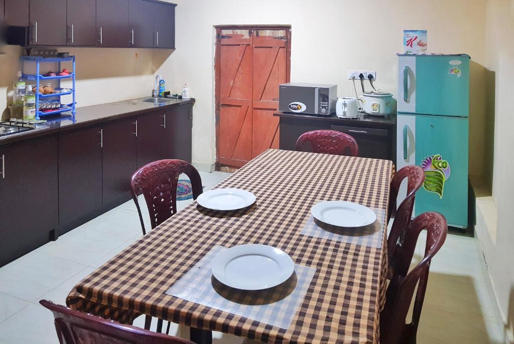 Kuchyň nebo kuchyňský kout v ubytování Nimal's Home